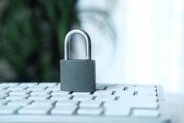 Internet Safety Concept With Padlocked On Computer Keyboard - Auster Inteligência Contábil