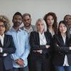 Group Of Multi Generational Business People Looking Serious On C - Auster Inteligência Contábil