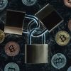 Top View Of Arranged Locks And Various Bitcoins On Dark Marble Surface - Auster Inteligência Contábil